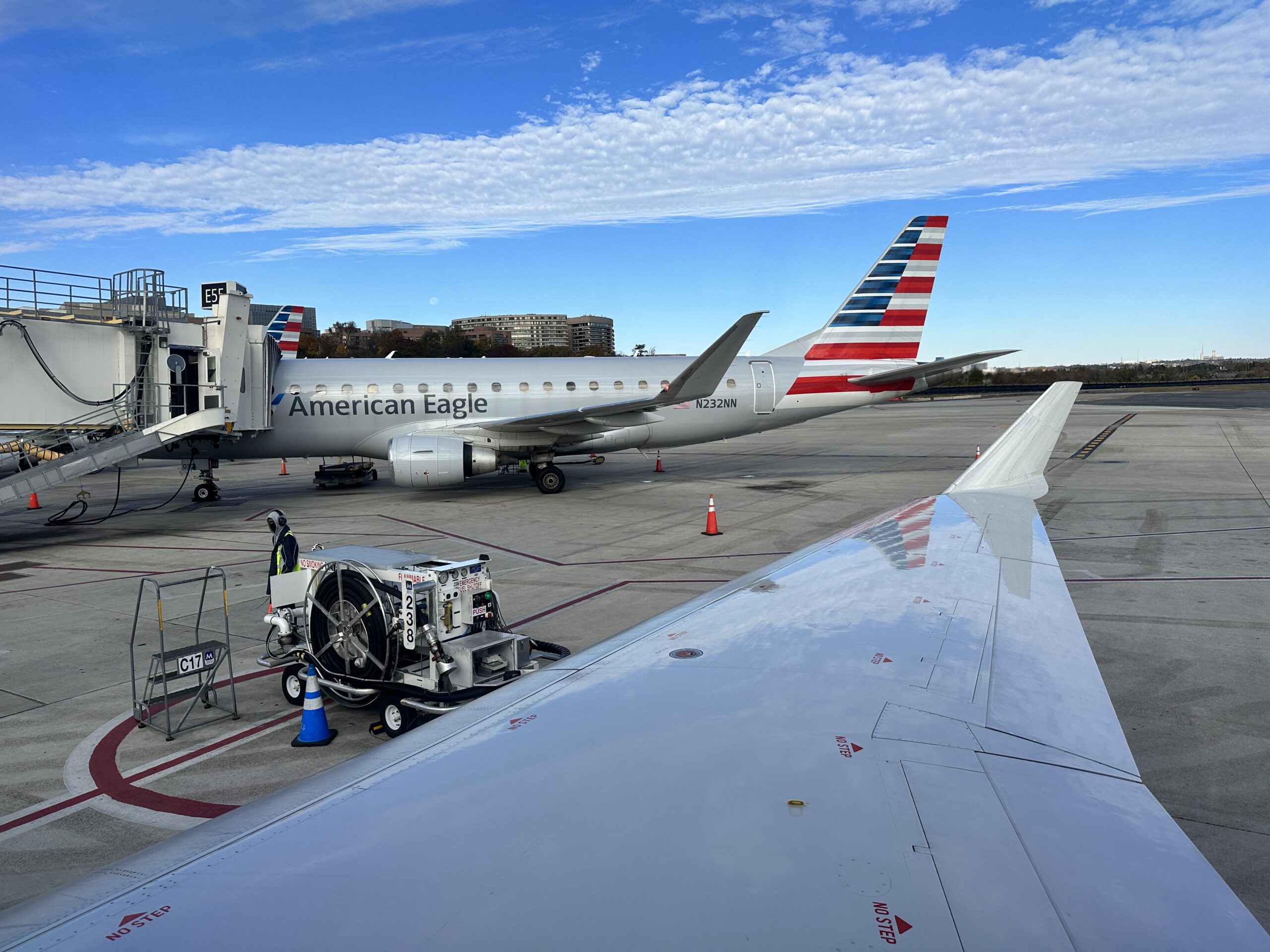 Photo of: American Eagle Crj-700 Wing View Looking At An E175